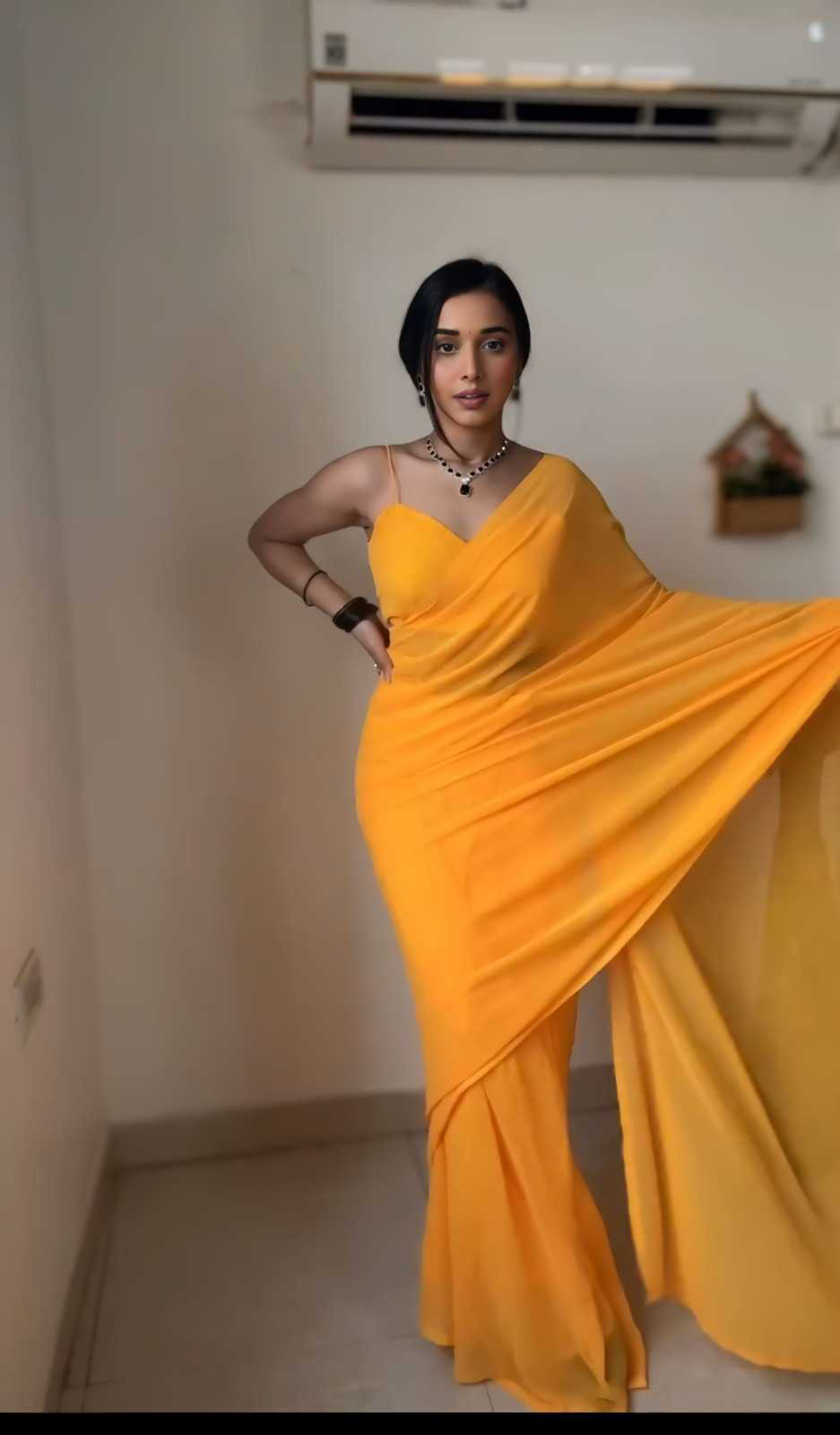 Pretty Yellow Color Soft Georgette Silk Design All Over Work Saree