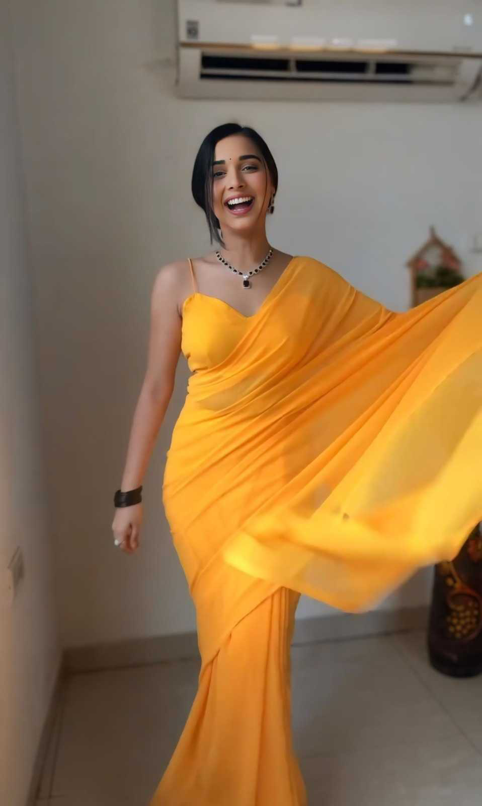 Pretty Yellow Color Soft Georgette Silk Design All Over Work Saree
