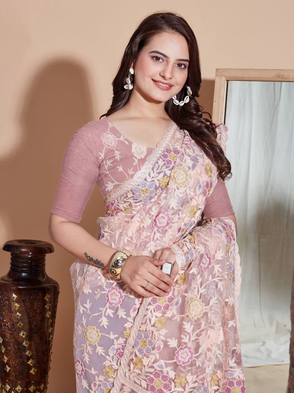 Butterfly Soft Net fabric with Embroider work and Multi work cut border Saree