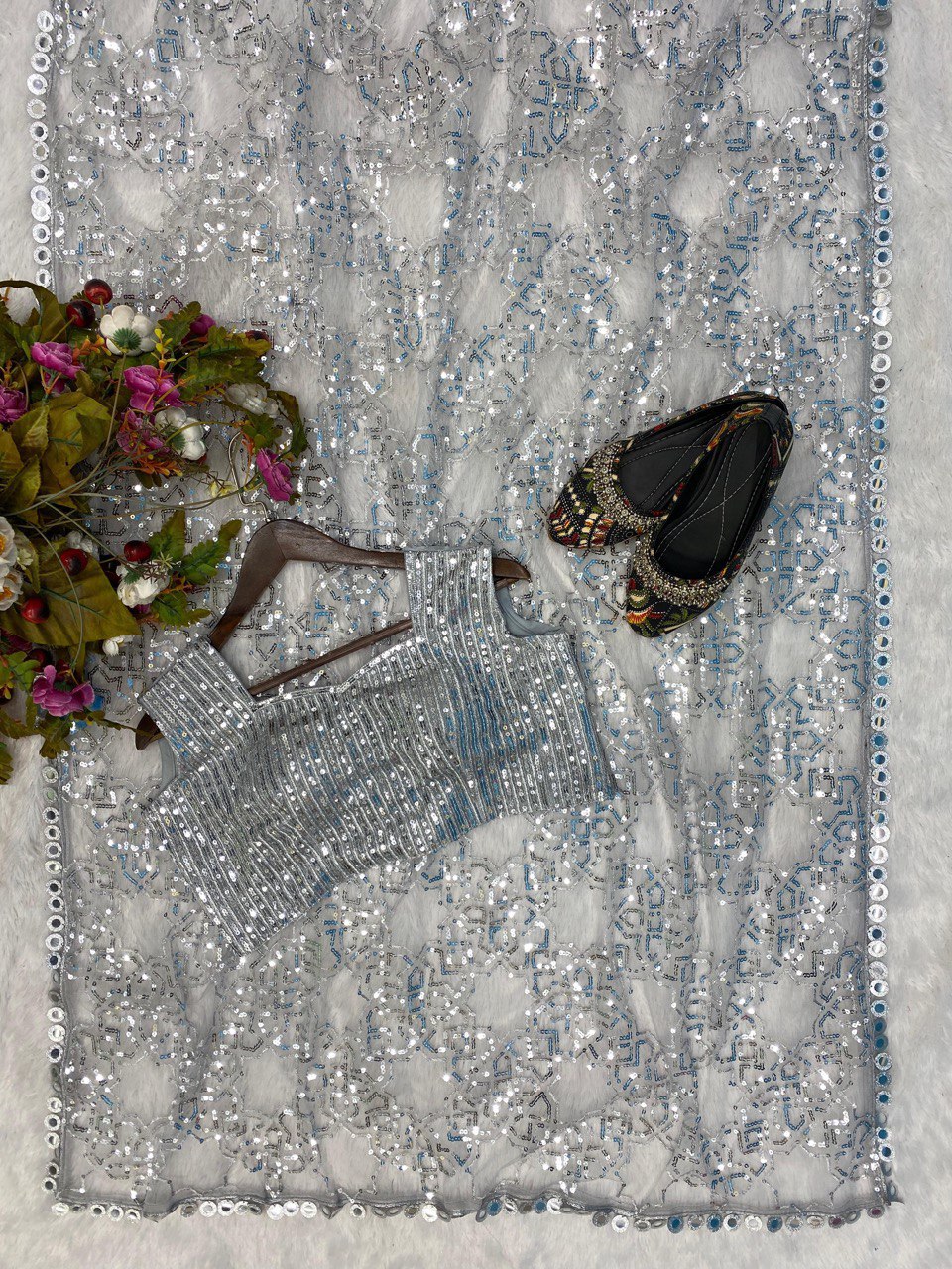 BUTTERY FLY HEAVY NET WITH SEQUANCE WORK SAREE