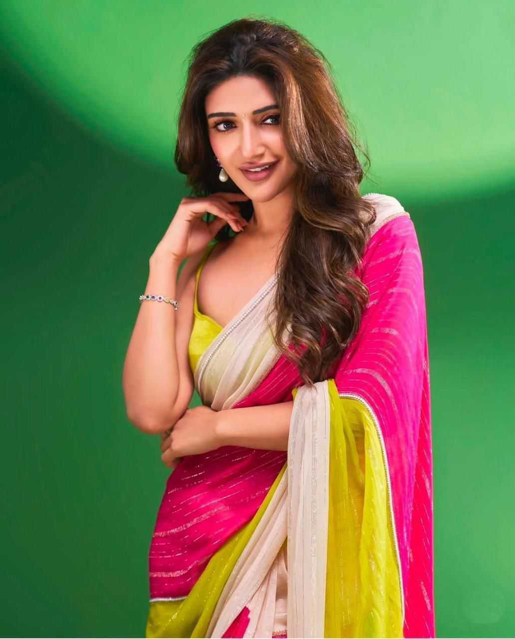 Pushpa Designer Blooming Georgette Saree with Zari Weave Stripes and Satin Border
